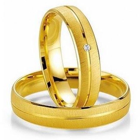 Par de alianças em ouro amarelo 18k/750.  Modelo com formato